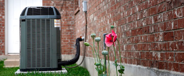 AC Unit outside a brick home)