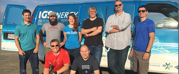 8 IGS Employees in Front of IGS Energy Van