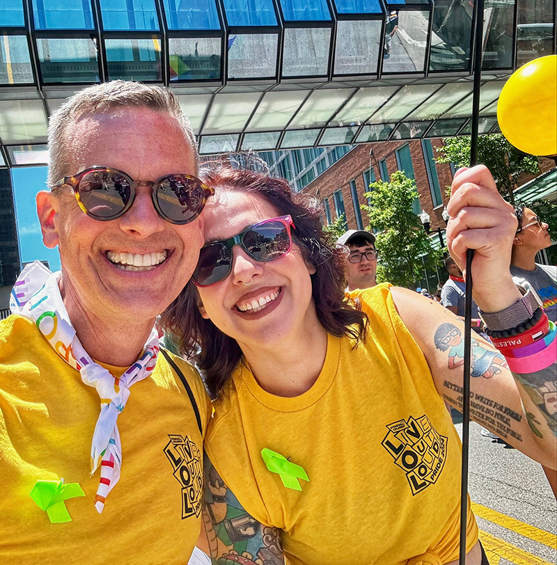 IGS Energy employees Norm Hall (L) and Nadia Zahran (R) at the Columbus Pride Parade in June 2024