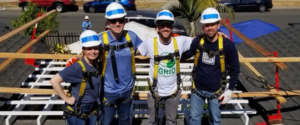 GRID and IGS Employees Installing solar panels